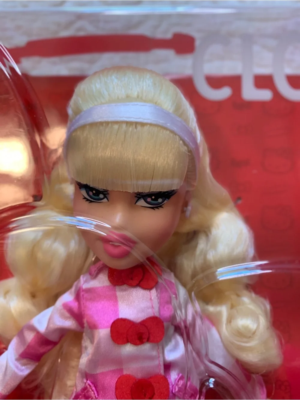 Bratz x Hello Kitty Cloe Sanrio Fashion Doll in Pink-White Plaid with Bow Purse
